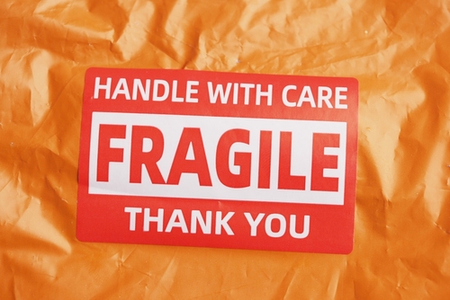 The Physics of Protection in Shipping a Delicate Package